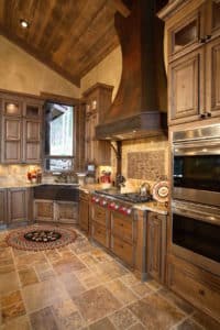 Kitchen Magazine features our custom Durango vent hood for high ceilings in rustic iron patina by raw urth designs
