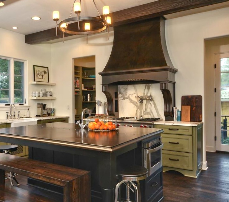 Dark Cabinets with rustic custom range hood and corbels by Raw Urth