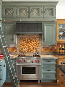Steel range hood with strapping and rivet detailing by raw urth designs-ktichen renovation by EKD