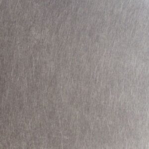 A close-up view of Antique Pewter reveals a textured grey surface with fine, soft lines running in various directions, resembling brushed metal or delicate fibers.