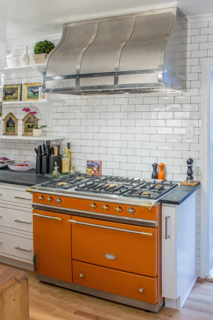 flashy kitchen showpiece to cover blower liner over an orange la canche range