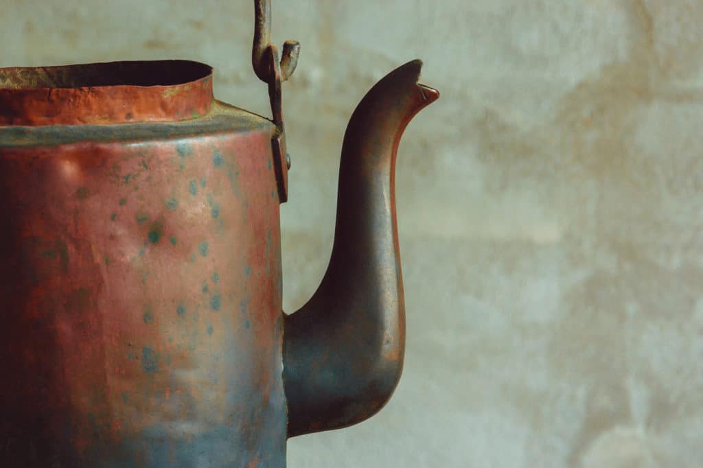 Natural patina on an old copper kettle. 