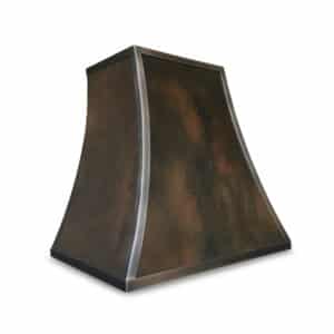 rustic and classic kitchen vent hood in aged copper like patina on steel
