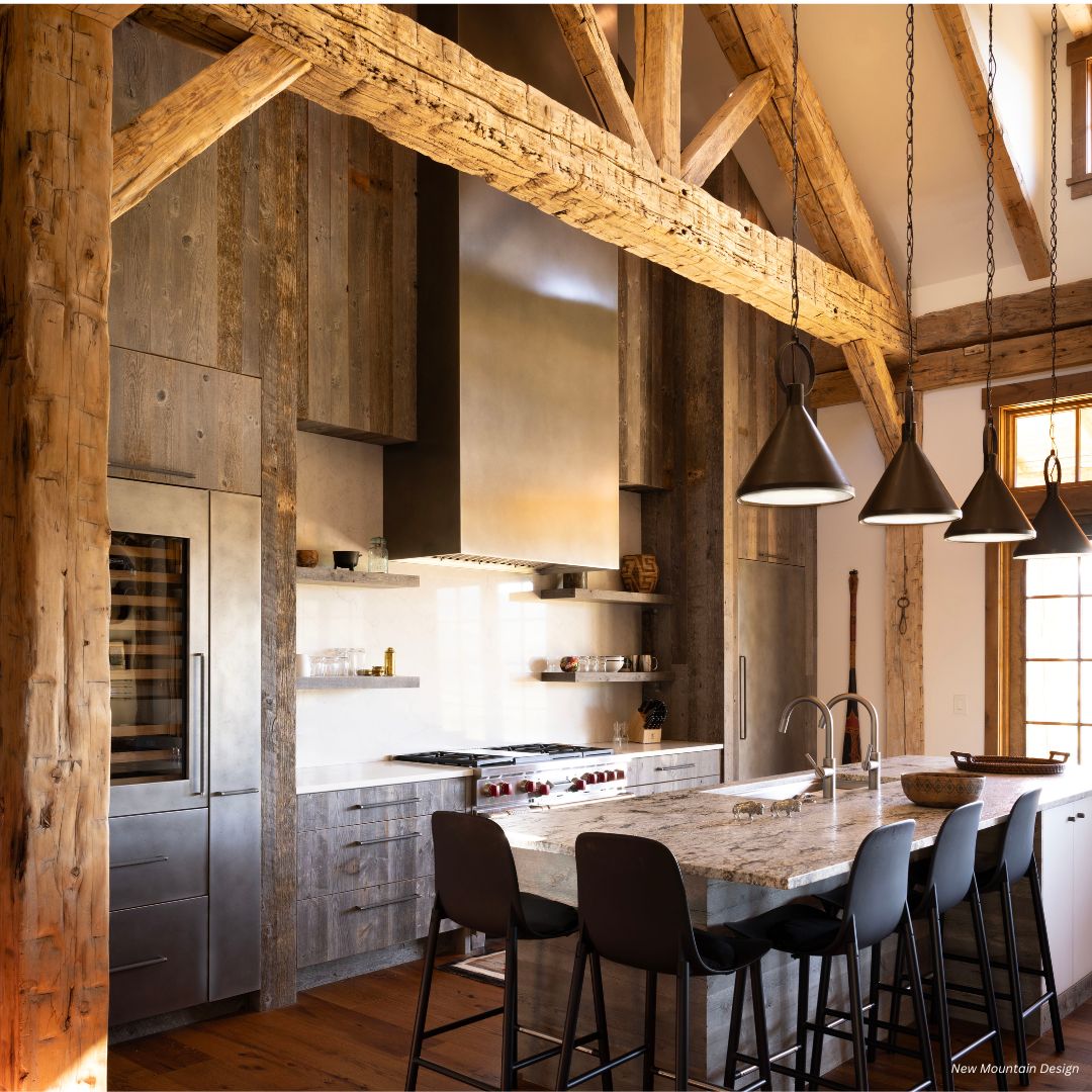 box-essential-gallery1√ (2) The box-essential-gallery1√ (2) brings rustic charm with exposed wooden beams, a marble island, black bar stools, modern pendants, stainless appliances, wood-paneled cabinets, and sunlit warmth through the window.
