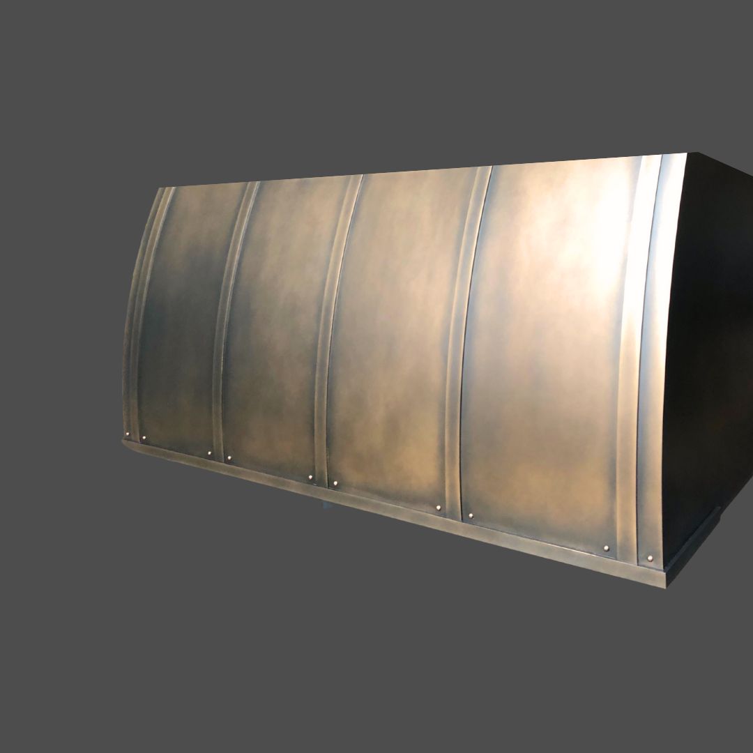 Bronze Antique 2 The Bronze Antique 2 is a large, metallic, curved rectangular structure featuring a bronze finish and vertical raised seams, shown against a plain gray background.