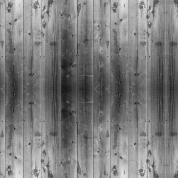 Brushed 4 Grayscale image titled "Brushed 4" featuring vertically aligned wooden planks with visible grain, knots, and a mirrored, symmetrical pattern forming a subtle gradient effect radiating from the center.