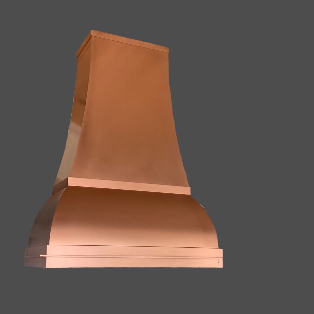 Copper Burnished 2 The Copper Burnished 2 range hood features a modern, curved design in a copper finish, displayed against a plain gray background.