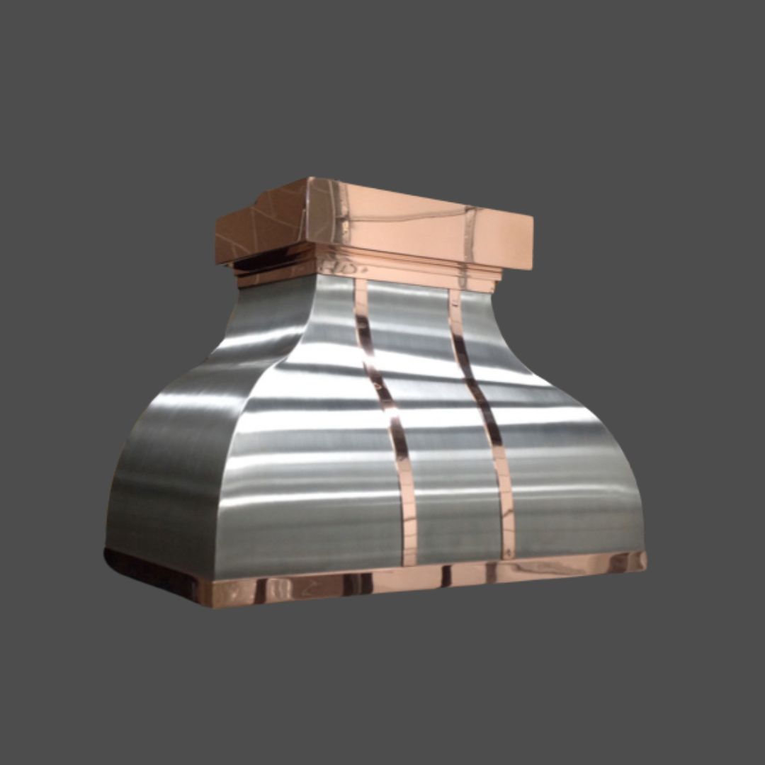 Copper Polished 1 The Copper Polished 1 is a metallic kitchen range hood with a brushed steel finish and polished copper accents, shown against a plain grey background.