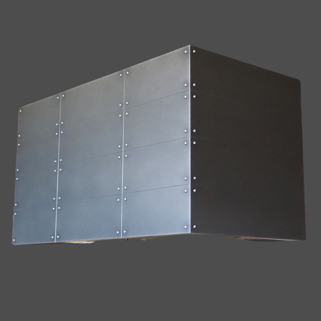 Gunnison gallery2 The Gunnison gallery2 is a large rectangular metallic object with a matte finish and visible rivets in a grid pattern, set against a plain dark gray background.
