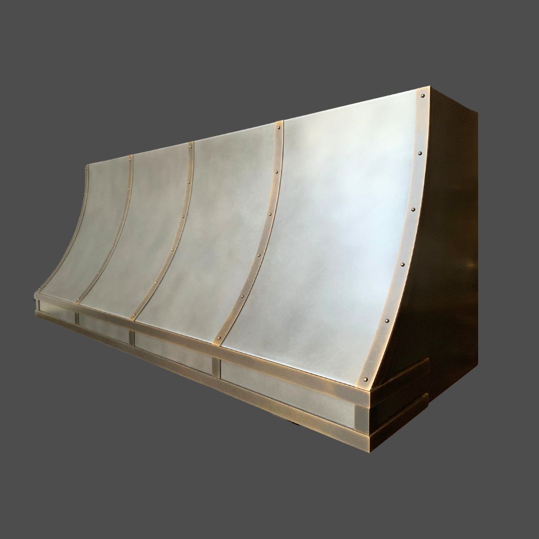 Pewter Antique 3 The Pewter Antique 3 is a large, metallic industrial hood with a smooth curved surface and riveted panels, showcased against a plain gray background.