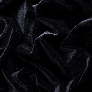 Raven Black 6768 (2) Close-up of Raven Black 6768 (2) velvet fabric, featuring its soft, smooth texture and subtle highlights and shadows along the crumpled folds.