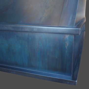 Slate 6919 (3) A close-up of the Slate 6919 (3), a bluish metallic box with smooth surfaces, defined edges, and subtle streaks and reflections.